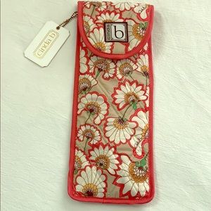 Cinda B straight/curling iron cover.